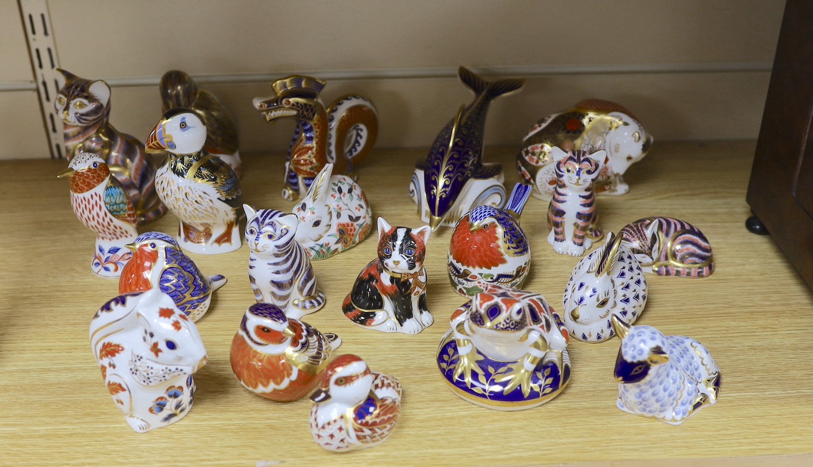 A collection of 20 Royal Crown Derby Imari animal and bird paperweights
